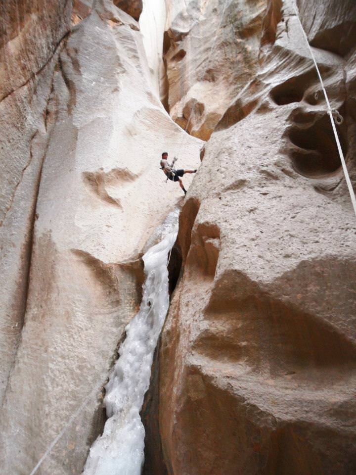 rappelling a frozen slot canyon in zion